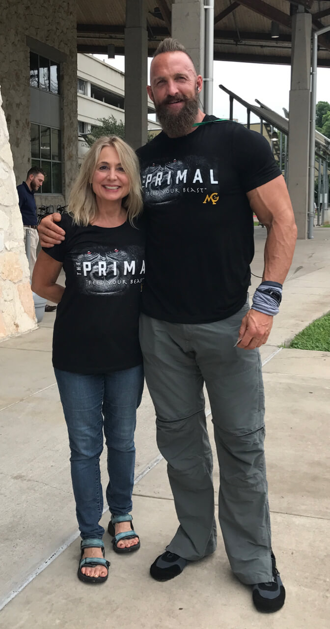 Cale Schultz and Mari Ann Lisenbe weating the new MariGold Primal T's at Paleo f(x) 2017