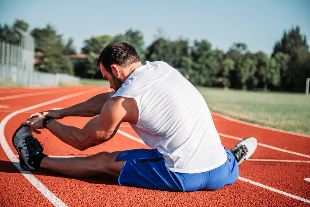 overcome-your-fitness-obstacles-man-stretching